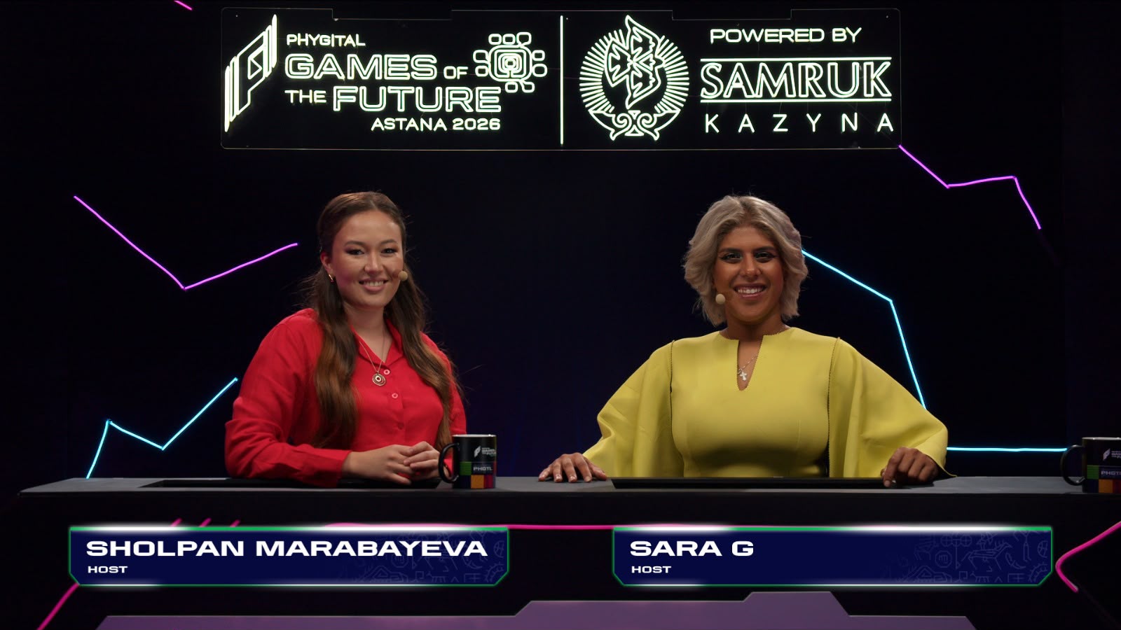 Live TV hosts on set for an On The Mic broadcast