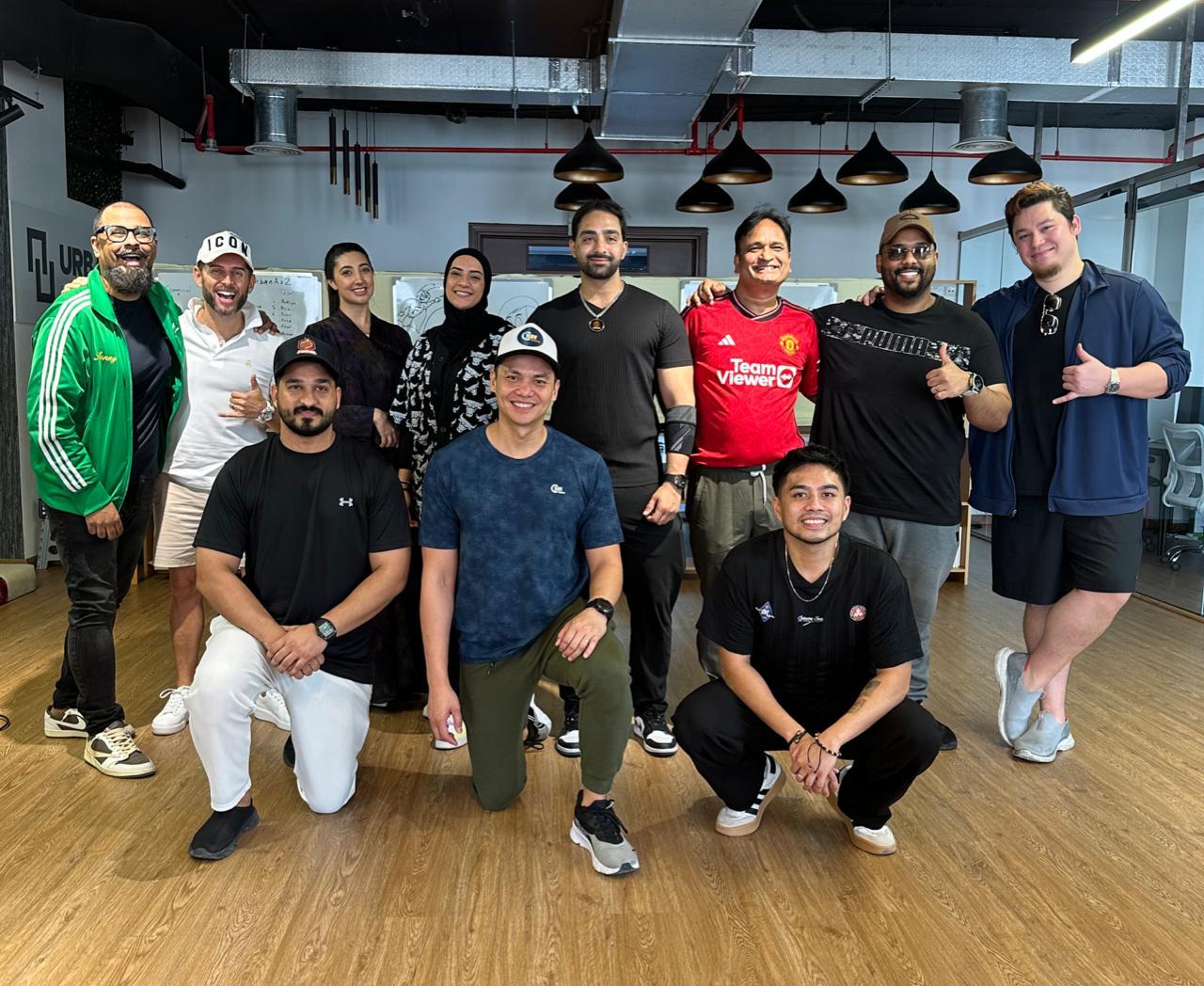 On The Mic team gathered after a sports presentation workshop