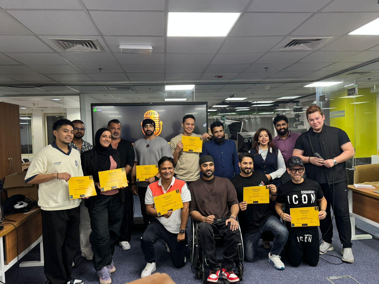 On The Mic team with certificates